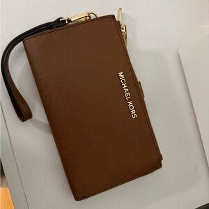 Michael Kors Tan Wristlet with Black Strap